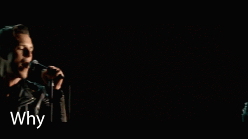 A Man Singing Into A Microphone With The Words Why You Wanna Fight It On The Bottom GIF