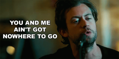 A Man Singing Into A Microphone With The Words " You And Me Ain 'T Got Nowhere To Go " Above Him GIF