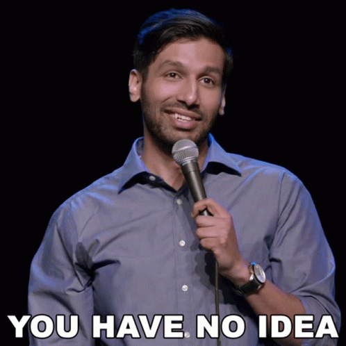 A Man Singing Into A Microphone With The Words " You Have No Idea " Above Him GIF