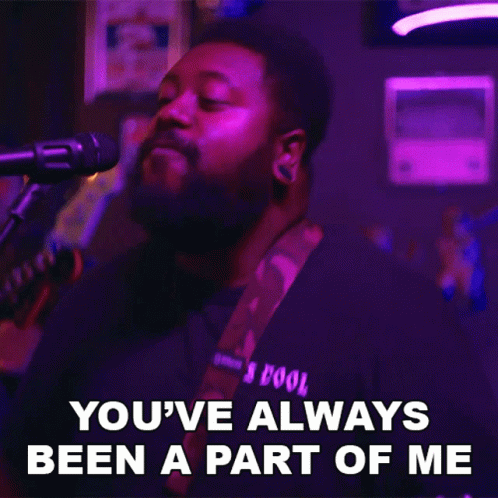 A Man Singing Into A Microphone With The Words " You 'Ve Always Been A Part Of Me " GIF