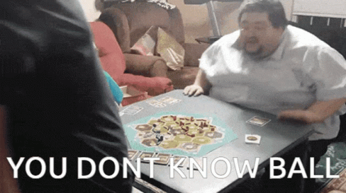 A Man Sits At A Table Playing A Board Game With The Words " You Dont Know Ball " Written Above Him GIF