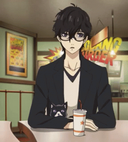 A Man Sits At A Table With A Cat And A Drink In Front Of A Sign That Says Grand Burger GIF