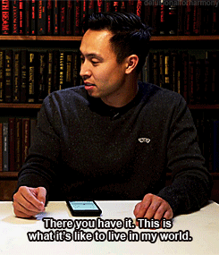 A Man Sits At A Table With A Cell Phone And Says There You Have It GIF