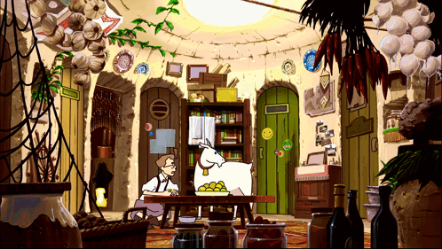 A Man Sits At A Table With A Goat On It GIF
