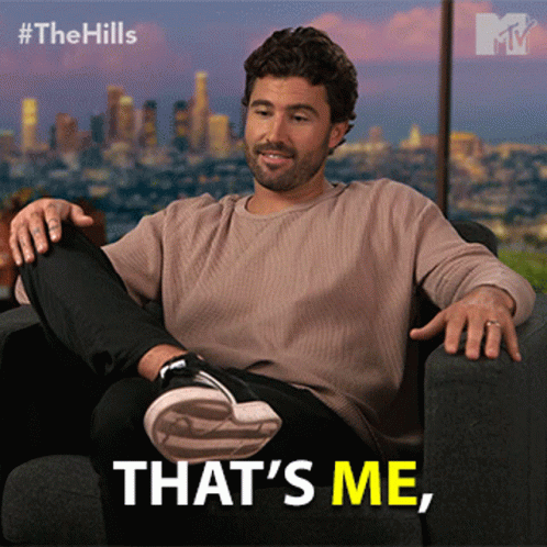 A Man Sits In A Chair With The Words That 'S Me GIF