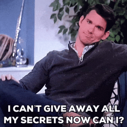 A Man Sits On A Couch With His Legs Crossed And Says I Can 'T Give Away All My Secrets GIF