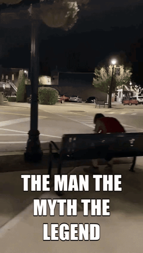 A Man Sits On A Park Bench With The Words The Man The Myth The Legend GIF