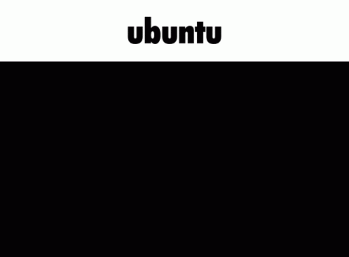 A Man Sitting At A Desk Using A Laptop With The Word Ubuntu On The Bottom GIF