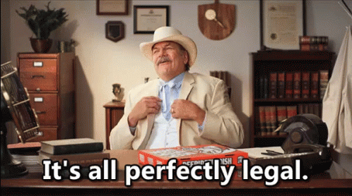 A Man Sitting At A Desk With A Box Of Pizza And The Words It 'S All Perfectly Legal On The Bottom GIF