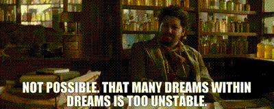 A Man Sitting At A Desk With A Quote That Says Not Possible That Many Dreams Within Dreams Is Too Unstable GIF