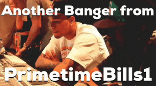 A Man Sitting At A Desk With The Words Another Banger From Primetime Bills GIF