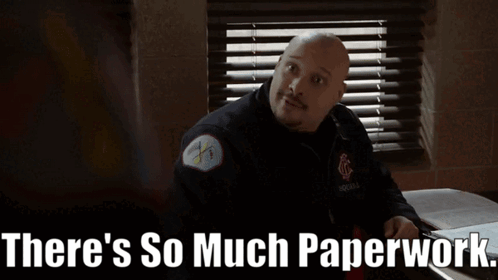 A Man Sitting At A Desk With The Words There 'S So Much Paperwork GIF