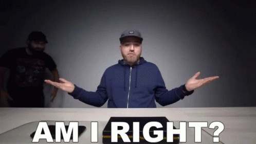 Man Sitting At Table With Am I Right Words GIF