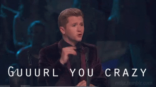 A Man Sitting At A Table With The Words " Guuuurl You Crazy " Written On The Bottom GIF