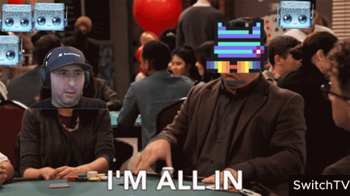 A Man Sitting At A Table With The Words I 'M All In GIF