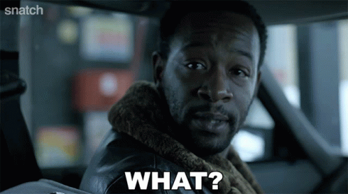 A Man Sitting In A Car With The Word What On His Face GIF