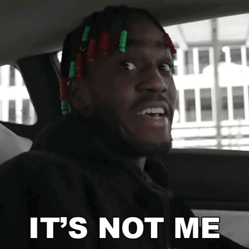 A Man Sitting In A Car With The Words It 'S Not Me Above Him GIF