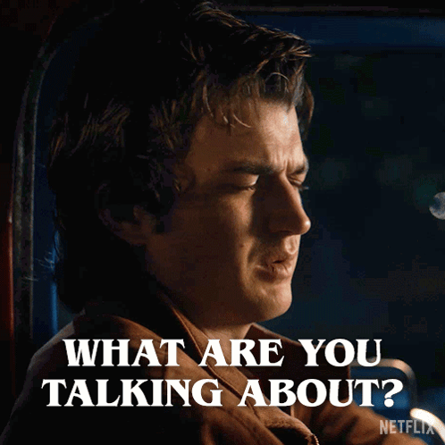 A Man Sitting In A Car With The Words What Are You Talking About Below Him GIF