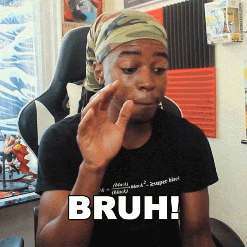 A Man Sitting In A Chair With The Word Bruh On His Shirt GIF