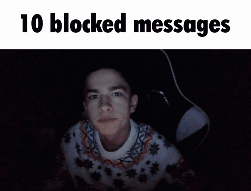 A Man Sitting In A Chair With The Words 10 Blocked Messages GIF