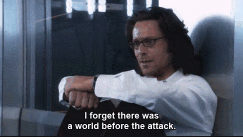 Man Sitting With Words I Forget There Was A World Before The Attack GIF