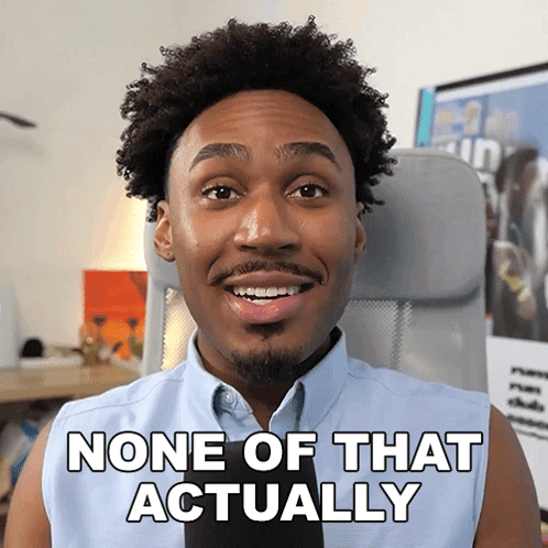 A Man Sitting In A Chair With The Words None Of That Actually On His Shirt GIF
