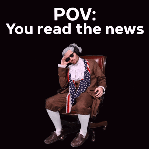 Man Sitting In Chair Reading News GIF