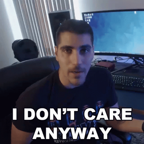 A Man Sitting In Front Of A Computer With The Words I Don 'T Care Anyway GIF
