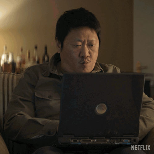 Man Sitting In Front Of Laptop Saying Oh Very Nice GIF