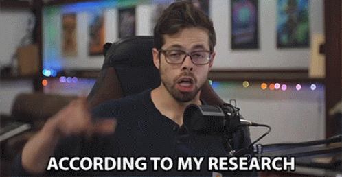 A Man Sitting In Front Of A Microphone With The Words According To My Research Written Below Him GIF