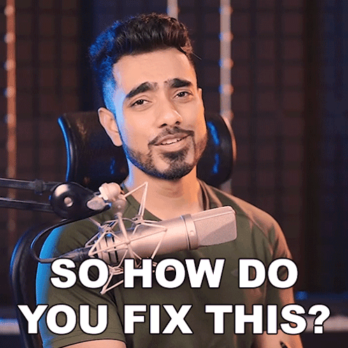 A Man Sitting In Front Of A Microphone With The Words So How Do You Fix This Behind Him GIF