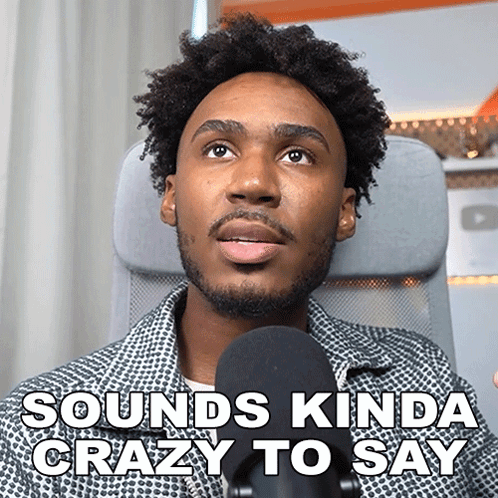 A Man Sitting In Front Of A Microphone With The Words " Sounds Kinda Crazy To Say " Above Him GIF
