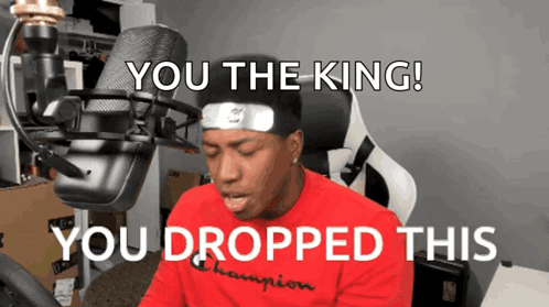 A Man Sitting In Front Of A Microphone With The Words You The King You Dropped This On The Bottom GIF