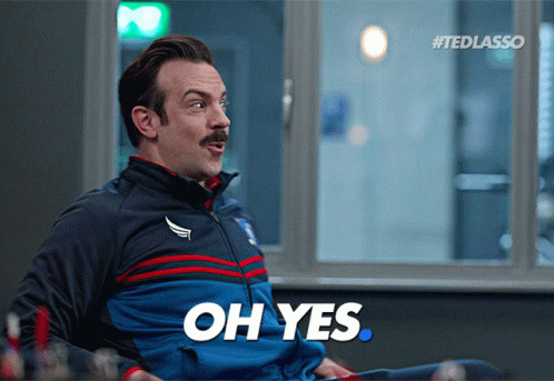 A Man Sitting In Front Of A Window Says Oh Yes GIF