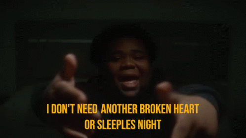 A Man Sitting On A Bed With His Hands On His Head And The Words I Don T Need Another Broken Heart Or Sleeples Night GIF