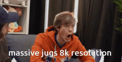 A Man Sitting On A Couch With His Mouth Open And The Words Massive Jugs 8K Resolution GIF