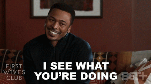 A Man Sitting On A Couch With The Words " I See What You 'Re Doing " GIF