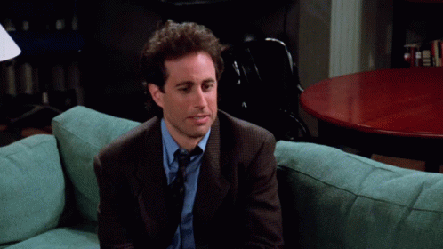A Man Sitting On A Couch With The Words " I Think I May Have Made A Big Mistake " Above Him GIF