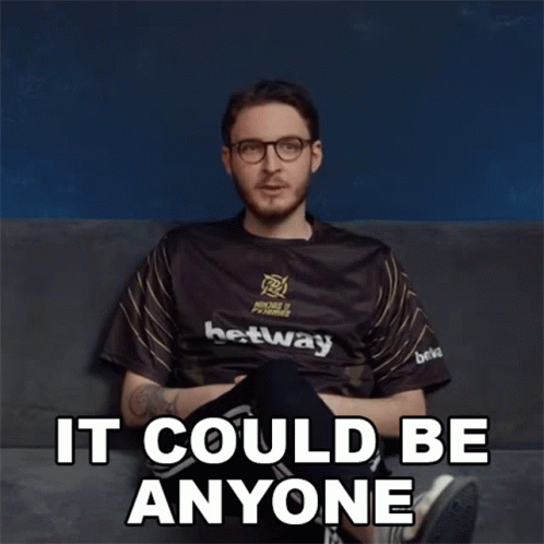 A Man Sitting On A Couch With The Words It Could Be Anyone Written On The Bottom GIF