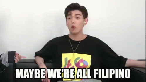 A Man Sitting On A Couch With The Words Maybe We 'Re All Filipino GIF