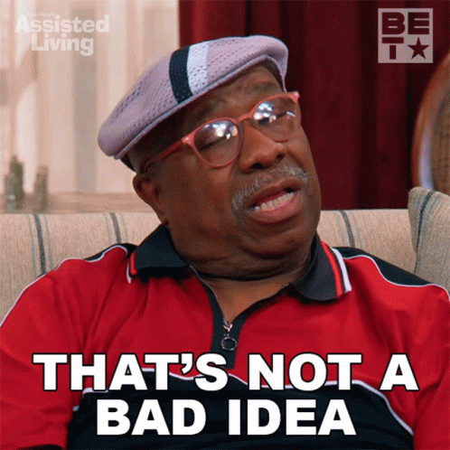 A Man Sitting On A Couch With The Words That 'S Not A Bad Idea On His Shirt GIF