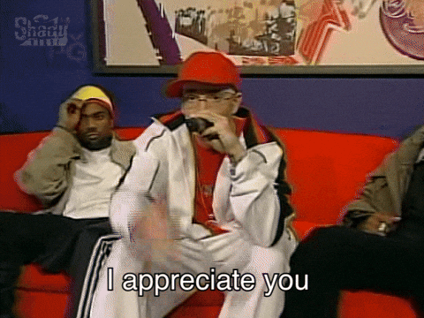 A Man Sitting On A Red Couch With The Words I Appreciate You On The Bottom GIF