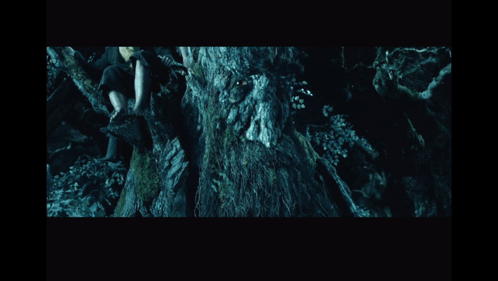 A Man Sitting On A Tree With The Words That Does N't Make Sense To Me Below Him GIF
