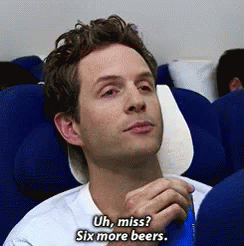 A Man Sitting On An Airplane Says " Uh Miss ? Six More Beers " GIF