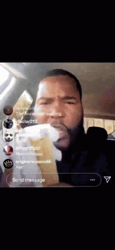 A Man Smoking A Cigarette In A Car With A Send Message Button In The Corner GIF