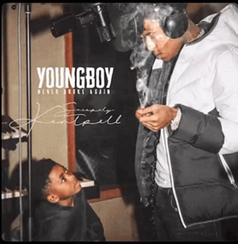 A Man Smoking A Cigarette Next To A Young Boy On The Cover Of Young Boy Never Broke Again GIF