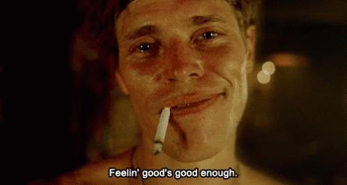 A Man Smoking A Cigarette With The Words Feelin ' Good 'S Good Enough Above Him GIF