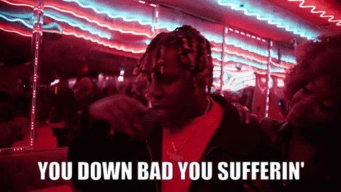 A Man Smoking A Cigarette With The Words You Down Bad You Sufferin ' GIF