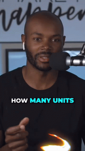 A Man Speaking Into A Microphone With The Words " How Many Units " On The Bottom GIF