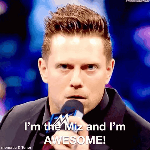 A Man Speaking Into A Microphone With The Words I 'M The Miz And I 'M Awesome GIF